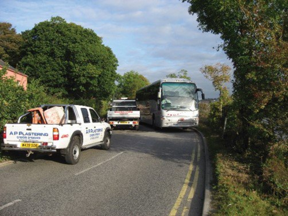 A controversial project to narrow the road entering a busy industrial estate in Truro has been ‘paused’ by Cornwall Council following an outcry from local businesses concerned about safety